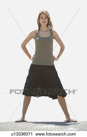 Stock Image - Woman in summer clothing. Fotosearch