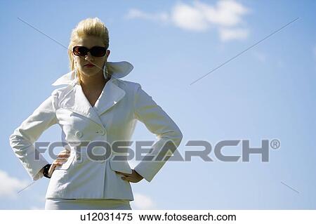 Stock Photography - Woman wearing sunglasses. Fotosearch
