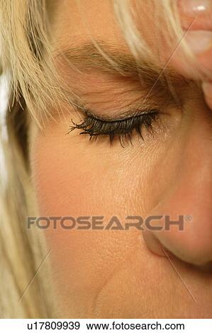 Woman with headache View Large Photo Image Stock Photo - Woman with headache. Fotosearch