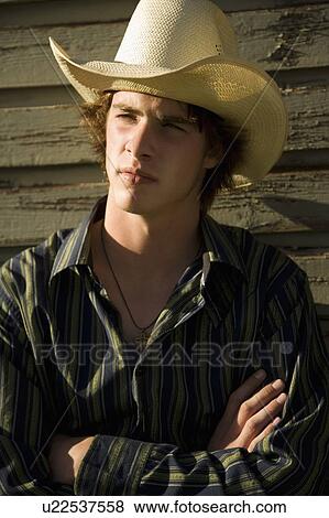 Young cowboy View Large Photo Image Stock Photo - Young cowboy. Fotosearch
