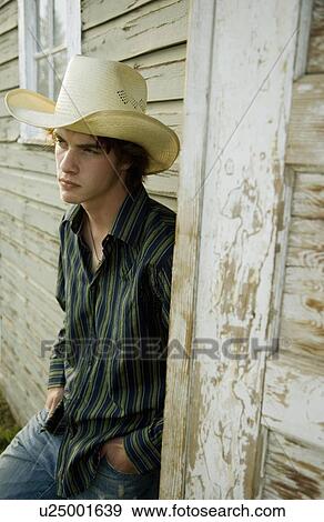 Young cowboy View Large Photo Image Stock Photo - Young cowboy. Fotosearch
