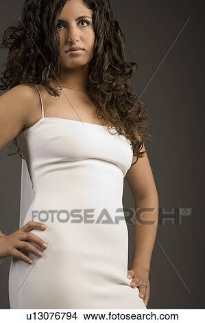Young woman posing View Large Photo Image Picture - Young woman posing. Fotosearch