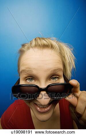 Young woman with sunglasses View Large Photo Image Stock Image - Young woman with sunglasses. Fotosearch