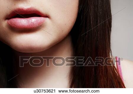 Closeup of a young woman's mouth View Large Photo Image Stock Image - Closeup of a young woman's mouth. Fotosearch