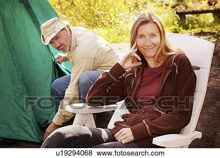 Stock Photo - Couple camping. Fotosearch
