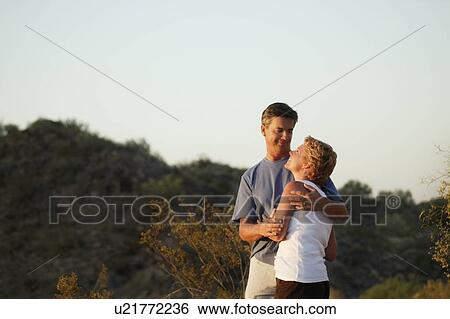 Couple embracing View Large Photo Image Stock Photograph - Couple embracing. Fotosearch