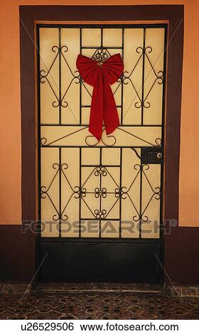 Stock Photograph - Door with decorative bow. Fotosearch