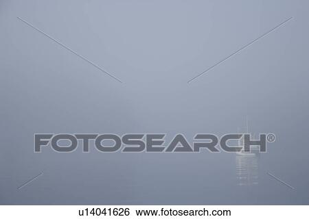 Stock Photograph - Fishing boat in a fog. Fotosearch