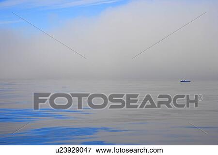Fishing boat out on water View Large Photo Image Stock Photo - Fishing boat out on water. Fotosearch
