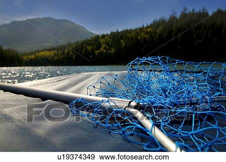 Stock Photo - Fishing net on boat. Fotosearch