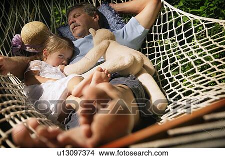 Grandfather and granddaughter View Large Photo Image Picture - Grandfather and granddaughter. Fotosearch