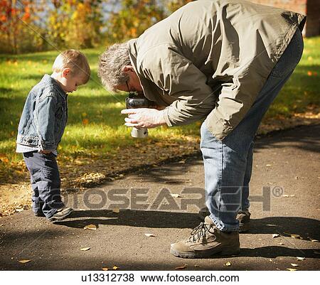 Grandfather and grandson View Large Photo Image Stock Photo - Grandfather and grandson. Fotosearch