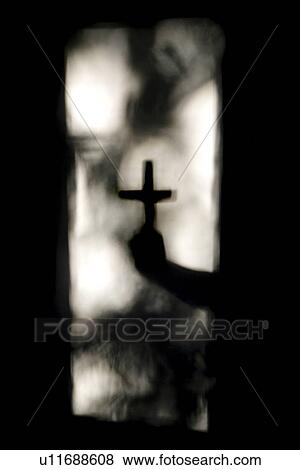 Stock Photo - Hand holding cross . Fotosearch