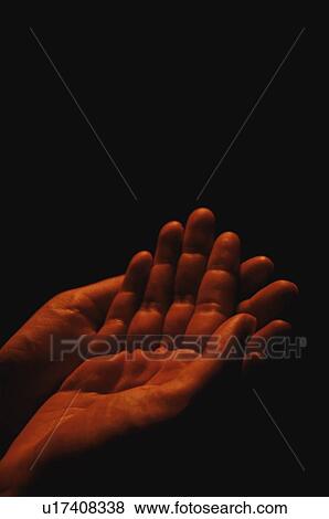 Stock Photo - Hands open to receive. Fotosearch