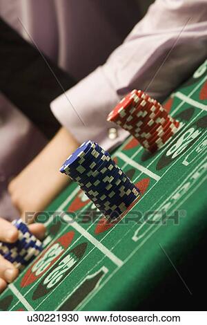 Man playing roulette View Large Photo Image Stock Image - Man playing roulette. Fotosearch