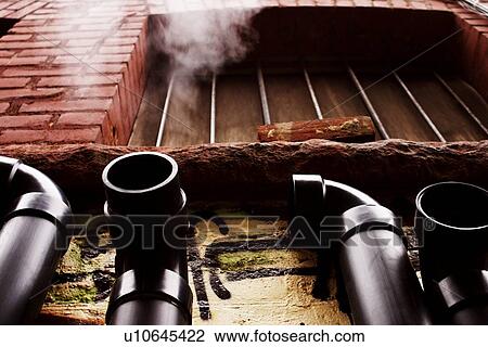 Pipes on the exterior of a building View Large Photo Image Stock Image - Pipes on the exterior of a building. Fotosearch