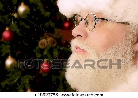 Stock Photograph - Profile of Santa Claus. Fotosearch