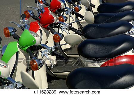 Stock Photo - Scooters in a row. Fotosearch