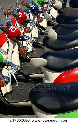 Stock Photograph - Scooters in a row. Fotosearch