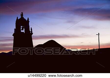 Silhouette of bell tower in Chipaya, Bolivia at sunset View Large Photo Image Stock Image - Silhouette of bell tower in Chipaya, Bolivia at sunset. Fotosearch