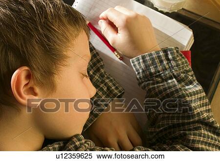 Student asleep on his notebook View Large Photo Image Stock Photography - Student asleep on his notebook. Fotosearch