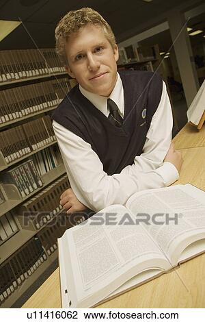 Student in library View Large Photo Image Stock Image - Student in library. Fotosearch