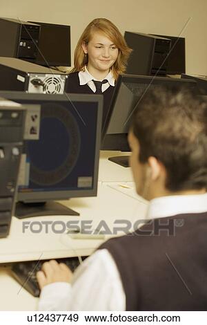 Stock Photo - Students working in computer lab. Fotosearch