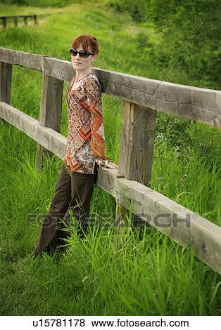 Stock Photo - Woman with sunglasses. Fotosearch