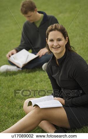 Young couple studying View Large Photo Image Stock Image - Young couple studying. Fotosearch