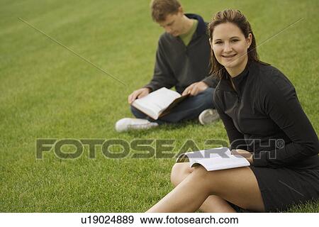Stock Photo - Young couple studying. Fotosearch