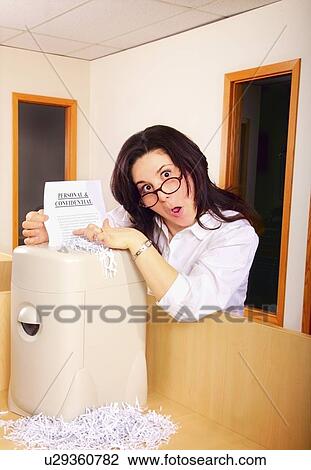 Stock Image - Discovering confidential information. Fotosearch