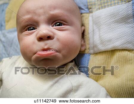 Frowning baby View Large Photo Image Stock Photo - Frowning baby. Fotosearch