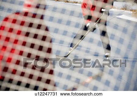 Playing hockey View Large Photo Image Stock Image - Playing hockey. Fotosearch