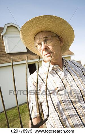 Senior farmer View Large Photo Image Stock Image - Senior farmer. Fotosearch