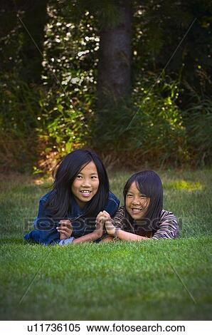 Sisters holding hands View Large Photo Image Stock Photography - Sisters holding hands. Fotosearch