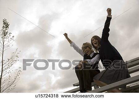 Stock Photo - Students cheering. Fotosearch