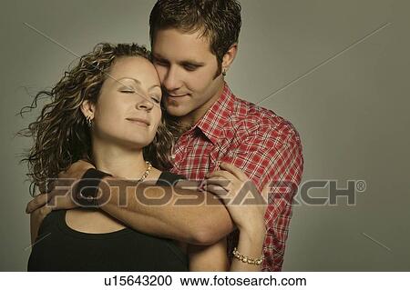 Stock Image - Couple embracing. Fotosearch