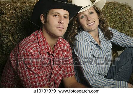 Stock Photo - Couple wearing western clothing. Fotosearch