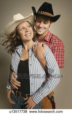 Stock Photo - Couple wearing western clothing. Fotosearch