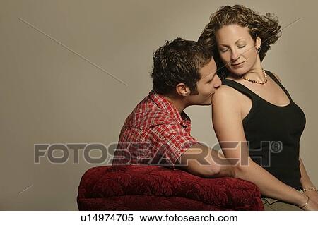 Man kissing a woman View Large Photo Image Stock Photography - Man kissing a woman. Fotosearch