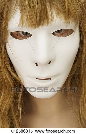 Woman wearing a mask View Large Photo Image Stock Photography - Woman wearing a mask. Fotosearch