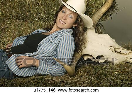 Stock Photograph - Woman wearing western clothing. Fotosearch