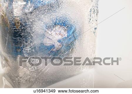 A globe completely covered in an ice block View Large Photo Image Stock Photo - A globe completely covered in an ice block. Fotosearch