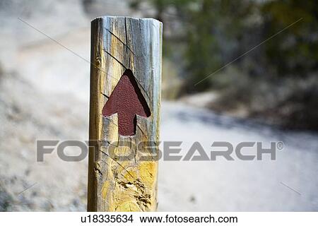 Arrow on post pointing up View Large Photo Image Picture - Arrow on post pointing up . Fotosearch
