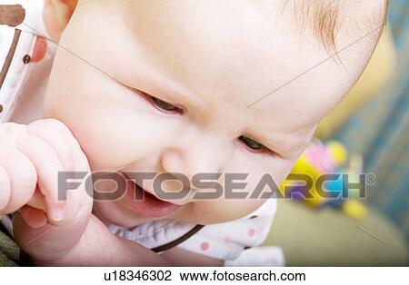 Baby looking confused View Large Photo Image Stock Image - Baby looking confused. Fotosearch