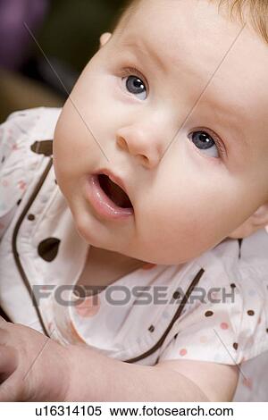 Stock Photography - Baby looking up. Fotosearch