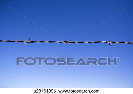 Barbed wire fence View Large Photo Image Stock Photography - Barbed wire fence. Fotosearch