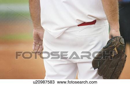 Stock Image - Baseball player's backside. Fotosearch