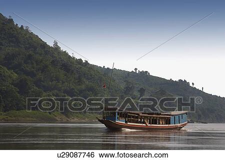 Stock Photograph - Boat on water. Fotosearch