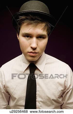 Stock Photo - Boy wearing hat. Fotosearch